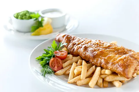 Battered hake and chips with tartare sauce